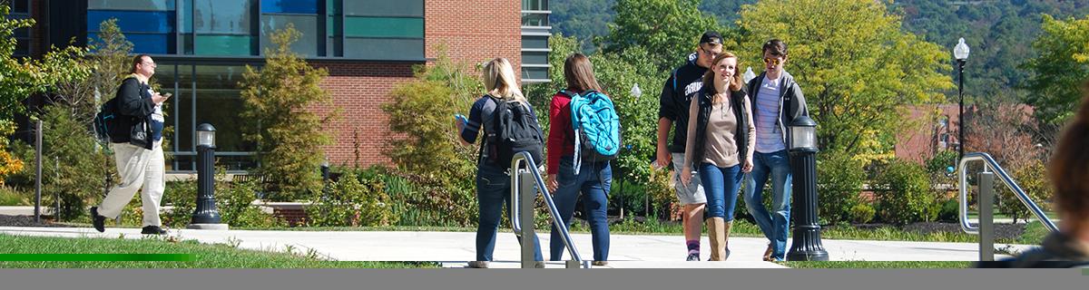 students climb the stairs in front of CCIT